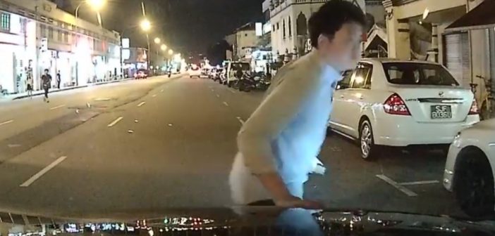 MAN TRYING TO KILL HIMSELF AT GEYLANG. RUN TOWARDS CAR!